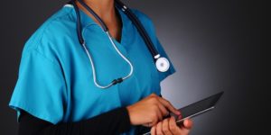 Nurse Using Tablet Computer