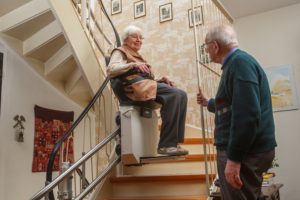 elderly couple at the stairlift