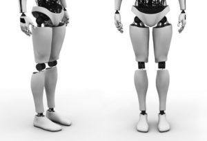 Male robot standing, three different angles.