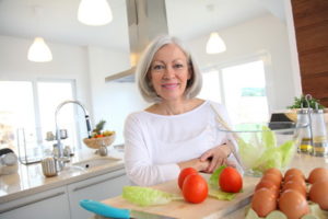 Portrait of senior woman in kitchen