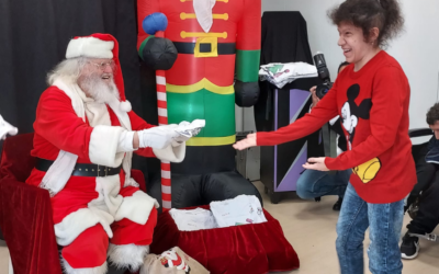 Buon Natale tutti insieme: la festa di OSA al presidio di via Santorre di Santarosa